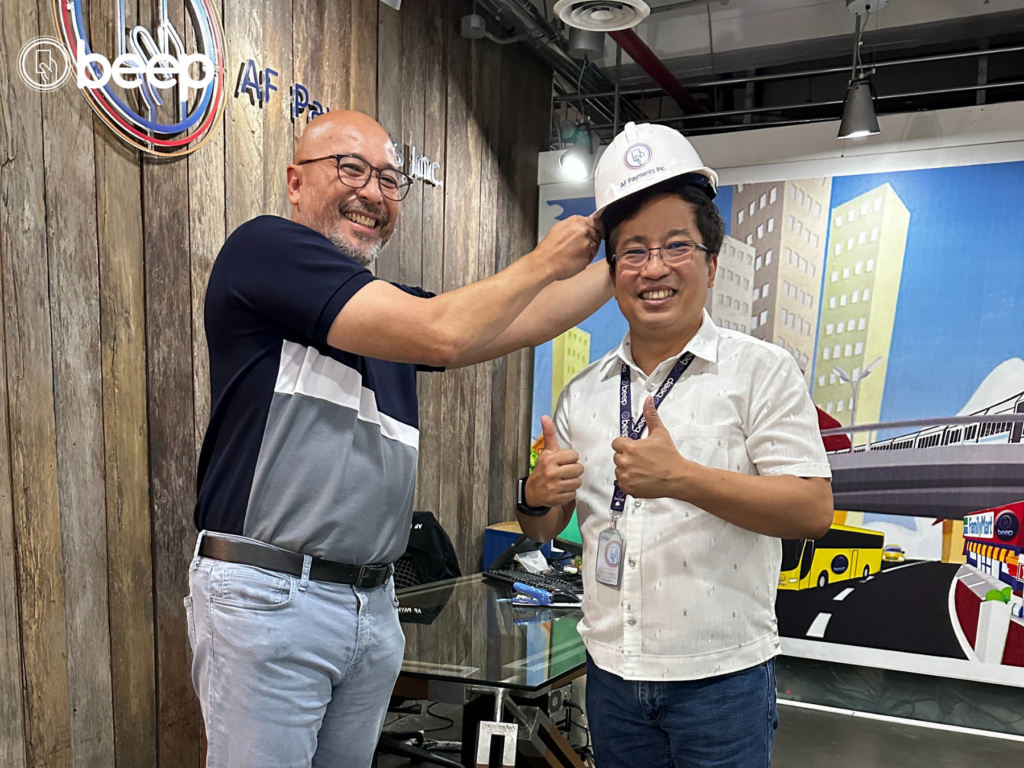 Outgoing President and CEO JJ Moreno, and incoming President and CEO Jojo. Carpio Jr.